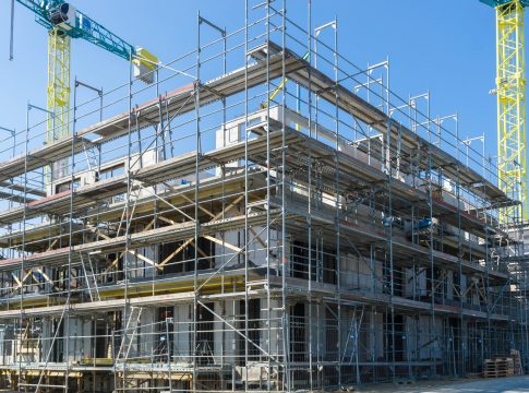construction site of a building – cranes in the background
