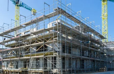 construction site of a building – cranes in the background